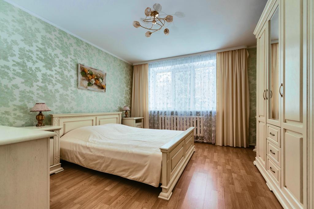 Кровать или кровати в номере Sanatorii Raduga