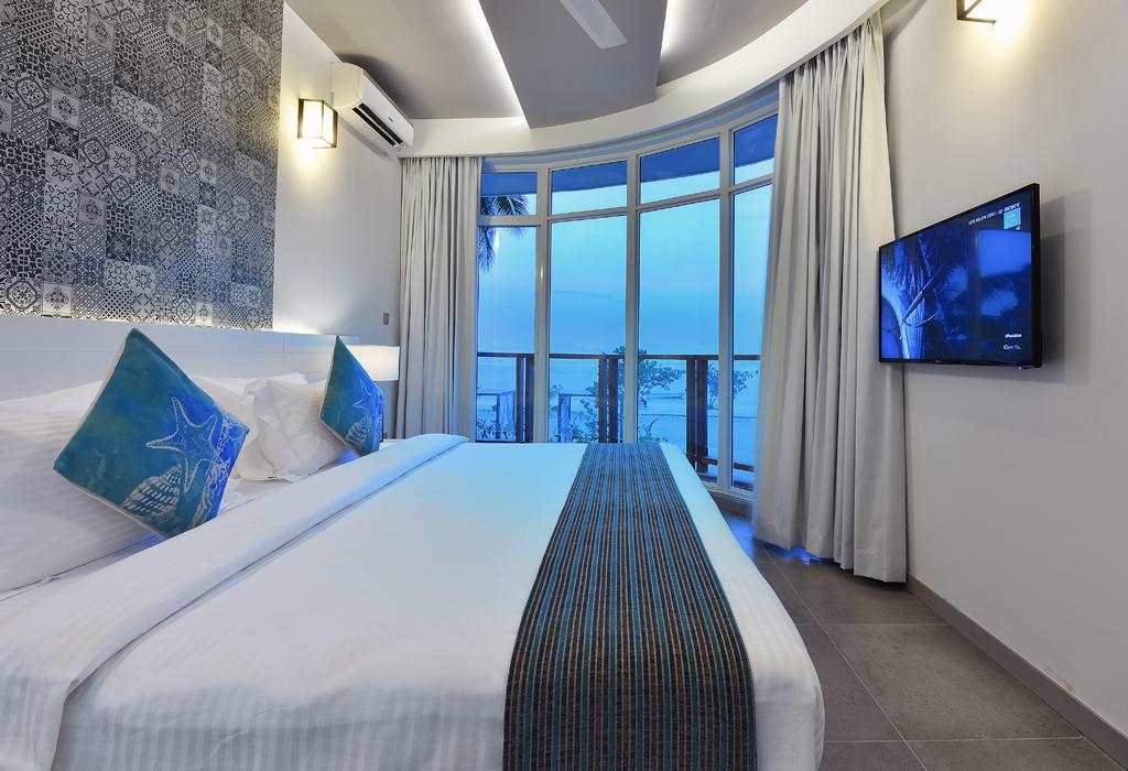 Отель Кровать или кровати в номере Velana Blu Maldives