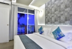 Кровать или кровати в номере Velana Blu Maldives