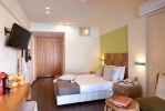 Кровать или кровати в номере Elounda Blu Hotel - Adults Only