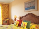 Кровать или кровати в номере Grecotel Marine Palace & Aqua Park