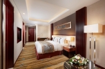 Кровать или кровати в номере Гостиница Пекин Минск