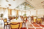 A restaurant or other place to eat at Europe Hotel