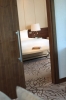 A bed or beds in a room at Renaissance Minsk Hotel