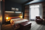Кровать или кровати в номере Виктория Отель & Бизнес Центр