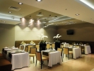 A restaurant or other place to eat at Victoria & SPA Minsk