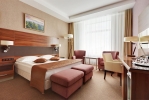 Кровать или кровати в номере Виктория Олимп Отель и бизнес-центр Минск