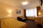 Кровать или кровати в номере Гостиница Беларусь