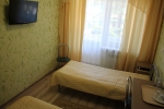 Кровать или кровати в номере Санаторий Приднепровский