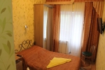Кровать или кровати в номере Санаторий Приднепровский