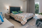 Кровать или кровати в номере Mareblue Beach