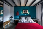 Кровать или кровати в номере Indigo Inn