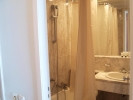 Ванная комната в Oceanis Hotel