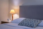 Кровать или кровати в номере Mitsis La Vita Beach Hotel
