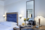 Кровать или кровати в номере Mitsis Lindos Memories Resort & Spa