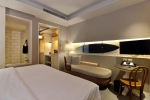 Кровать или кровати в номере Sugar Marina Resort-SURF-Kata Beach