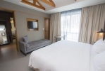 Кровать или кровати в номере Sugar Marina Resort-SURF-Kata Beach