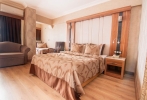 Кровать или кровати в номере Didim Beach Resort Aqua and Elegance Thalasso
