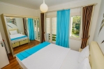 Кровать или кровати в номере Costa Luvi Hotel - All Inclusive