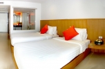 Кровать или кровати в номере Welcome Jomtien Beach Hotel