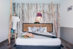 Кровать или кровати в номере The Hideaway Resort