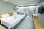Кровать или кровати в номере Andaman Cannacia Resort & Spa