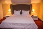 Кровать или кровати в номере Santa Quaranta Premium Resort