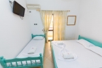 Кровать или кровати в номере ALER Hotel Durres