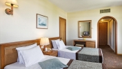 Кровать или кровати в номере Ozkaymak Marina Hotel
