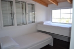 Кровать или кровати в номере Villa August Ksamil