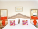 Кровать или кровати в номере Grand Leoniki Residence by Grecotel 