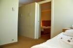 Кровать или кровати в номере Amara Centro Resort