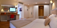 Кровать или кровати в номере Sandy Beach Resort