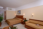 Кровать или кровати в номере Vantaris Palace