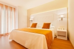 Кровать или кровати в номере Hotel Beverly Park & Spa