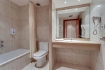 Ванная комната в Hotel Gran Garbi Mar & AquasPlash