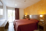 Кровать или кровати в номере Hotel Don Juan Resort