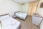 Кровать или кровати в номере Esal Hotel
