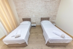 Кровать или кровати в номере Esal Hotel