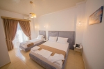 Кровать или кровати в номере Hotel Murati