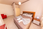 Кровать или кровати в номере Fiore Hotel