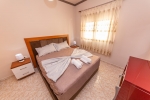 Кровать или кровати в номере Fiore Hotel
