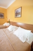 Кровать или кровати в номере Hotel WGrand