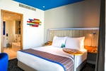 Кровать или кровати в номере Park Inn by Radisson Abu Dhabi Yas Island