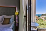 Кровать или кровати в номере Hotel Lusso Mare