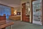 Кровать или кровати в номере Hotel Rivijera
