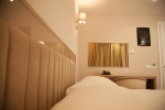 Кровать или кровати в номере Royal G Hotel and Spa