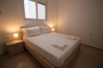 Кровать или кровати в номере Kristina Suites