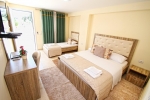 Кровать или кровати в номере Sofo Hotel Dhermi