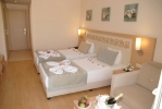 Кровать или кровати в номере Hotel Titan Select All Inclusive